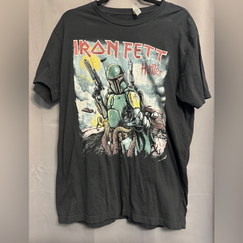 Next Level Apparel Black Iron Fett Graphic Tee with Red and Green Print